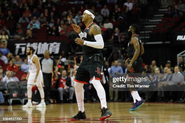 Carmelo Anthony of the Houston Rockets reacts after a three point shot in the first half against the Utah Jazz at Toyota Center on October 24, 2018...