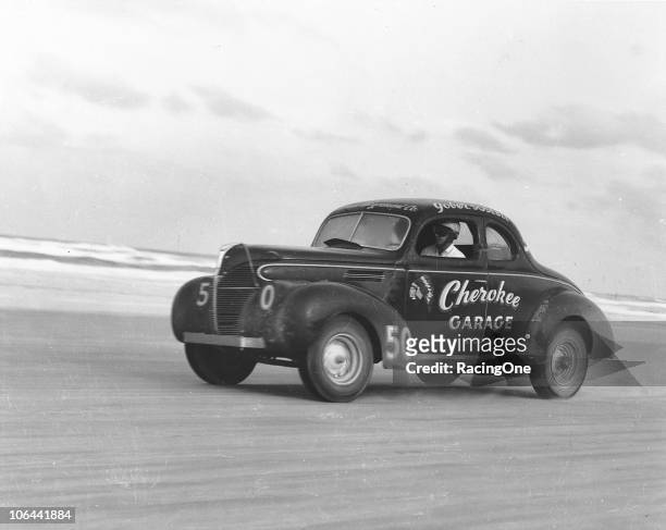 Gober Sosebee at speed in his 1939 Ford on the way to winning the NASCAR Modified race on the Daytona Beach-Road Course.