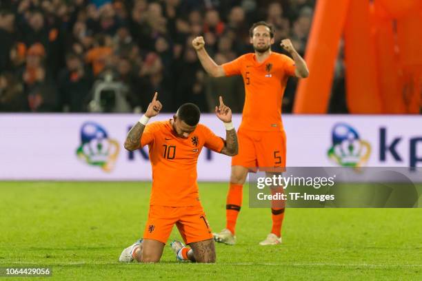 Memphis Depay of Netherlands and Daley Blind of Netherlands celebrates after winning the UEFA Nations League A group one match between Netherlands...