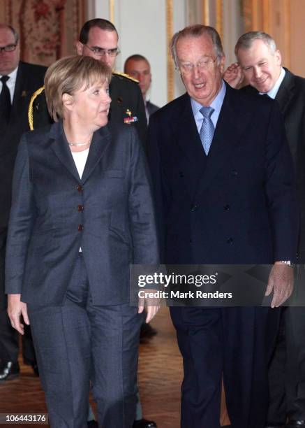 German Chancellor Angela Merkel, King Albert II of Belgium and Belgian Prime Minister Yves Leterme pose for a photo at Laeken Castle on November 2,...