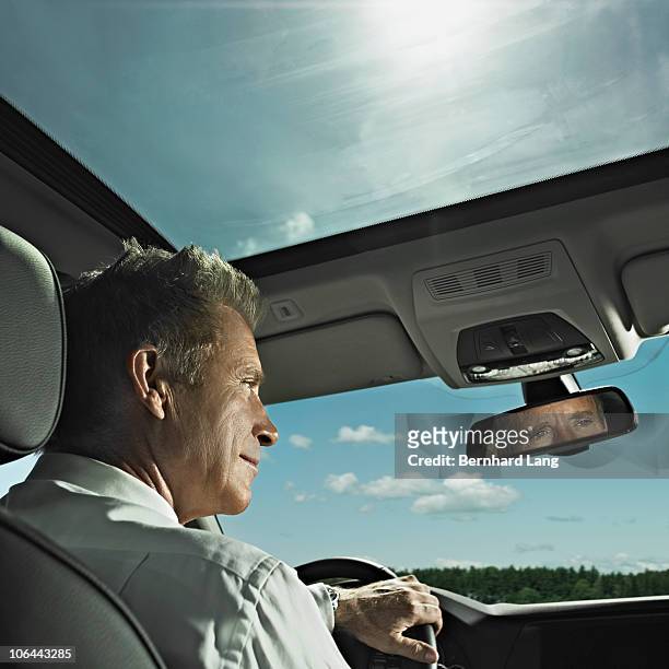 businessman in car - sunroof stock pictures, royalty-free photos & images