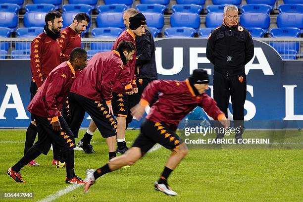 Roma's coach Claudio Ranieri watches his players during a training on the eve of their group E UEFA Champions League football match FC Basel vs AS...