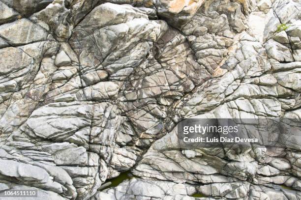 rock textures - cliff texture stock pictures, royalty-free photos & images