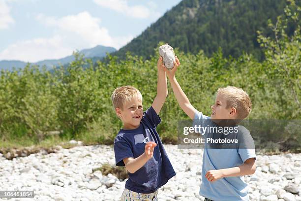 Kid Collecting Rocks 558 Kids Collecting Rocks Stock Photos, High-Res Pictures, and Images ...