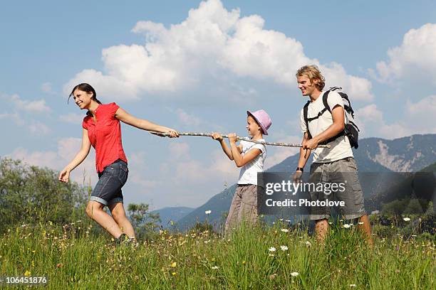 free time in the mountains - mom flirting stockfoto's en -beelden