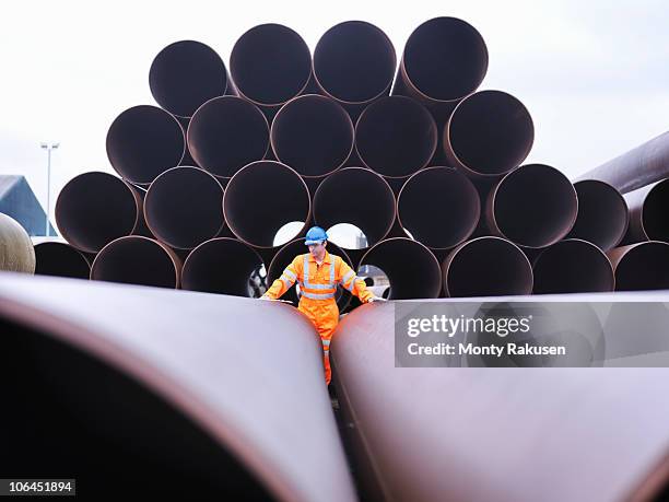 man checking pipes - surface preparation stock pictures, royalty-free photos & images