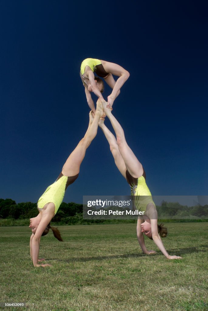 Acrobatic troop performing moves