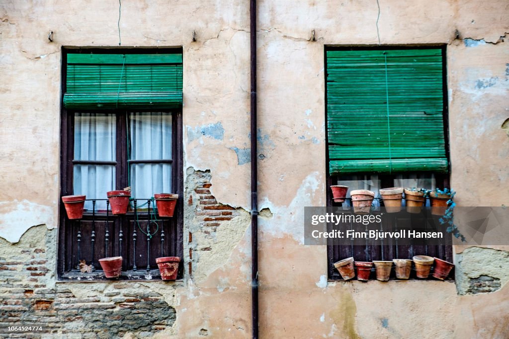 Typical spanish windows in the city of old Granada Spain