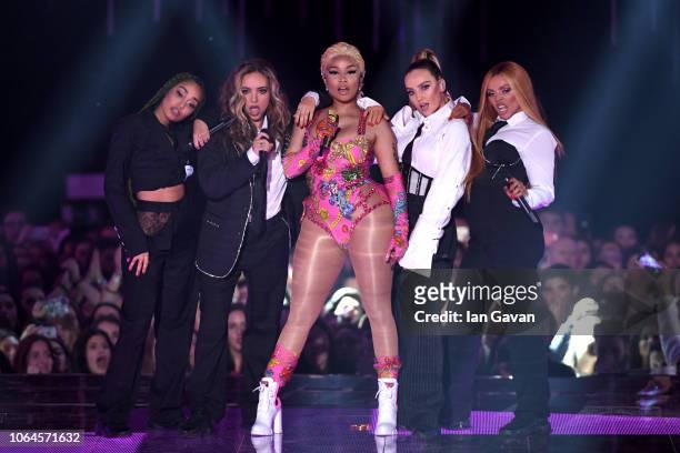 Leigh-Anne Pinnock and Jade Thirlwall of Little Mix, Nicki Minaj, Perrie Edwards and Jesy Nelson of Little Mix perform on stage during the MTV EMAs...