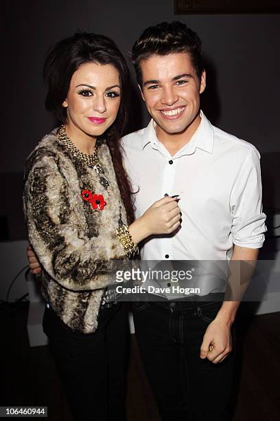 Cher Lloyd and Joe McElderry pose in the afterparty at the Cosmopolitan Ultimate Women of the Year awards 2010 held at Banqueting House on November...