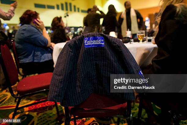 Childs suit coat shows support for Democratic candidate for Wisconsin, Russ Feingold during the beginning of the election night party in the midterm...