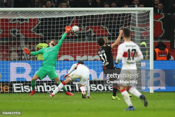 Kevin Volland of Bayer 04 Leverkusen shoots and scores the second goal of the game past Goalkeeper, Lukas Hradecky of VfB Stuttgart during the...