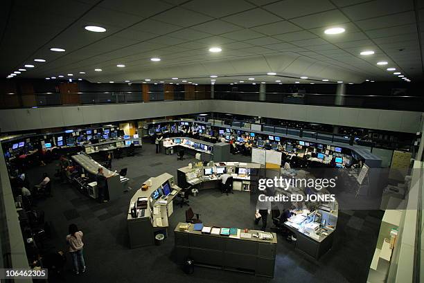 Aviation-IT-Internet-security FEATURE by Adrian Addison In a picture taken on October 13, 2010 Air Traffic Controllers monitor flight traffic in the...