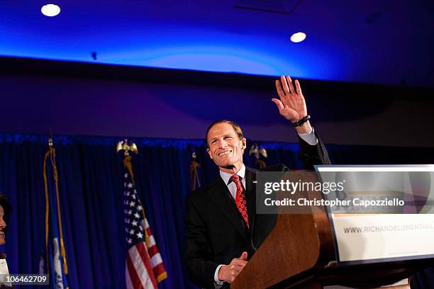 Democratic senatorial candidate Richard Blumenthal waves as he announces his victory over Republican Linda McMahon during an election night event at...