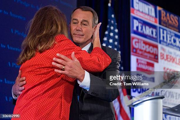 House Minority Leader John Boehner, R-Ohio, hugs his wife Debbie after addressing the crowd at the NRCC Election Night Watch party at the Grand Hyatt...