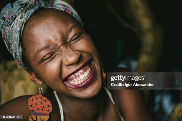 laughing is the best of life - female laughing face stock pictures, royalty-free photos & images