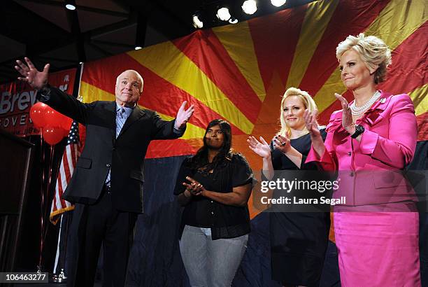 Sen. John McCain speaks to the crowd with his wife Cindy McCain and daughters Meghan McCain and Bridget McCain during an Arizona Republican Party...