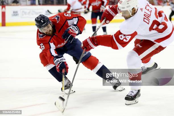 Michal Kempny of the Washington Capitals blocks the shot of Trevor Daley of the Detroit Red Wings during the third period at Capital One Arena on...