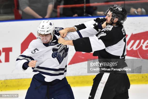 Thomas Ethier of the Blainville-Boisbriand Armada fights with Jordan Lepage of the Rimouski Oceanic during the QMJHL game at Centre d'Excellence...