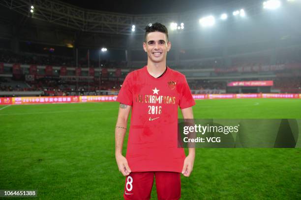 Oscar of Shanghai SIPG poses for a photo during the award ceremony of the 2018 Chinese Super League 29th round match between Shanghai SIPG and...