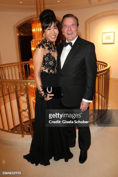 Former Chancellor Gerhard Schroeder and his wife Soyeon Schroeder-Kim during the 67th Bundespresseball at Hotel Adlon on November 23, 2018 in Berlin,...