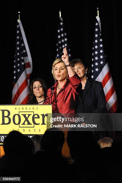 Senator Barbara Boxer celebrates with daughter Nicole and Senator Dianne Feinstein after winning a fourth term, in the Democratic Party headquarters...