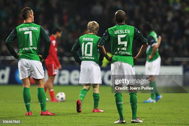 Player of Bremen are seen after Nacer Chadli of Twente scored his team's first goal during the UEFA Champions League group A match between SV Werder...