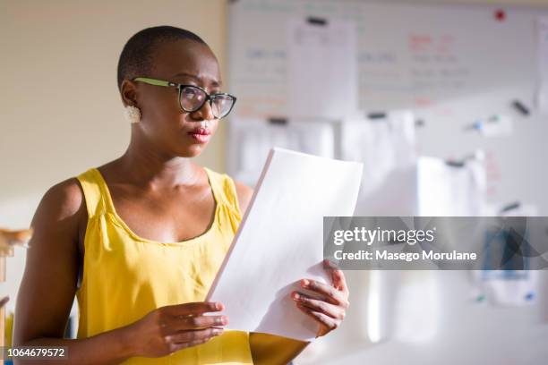 woman reading - showus office stock pictures, royalty-free photos & images