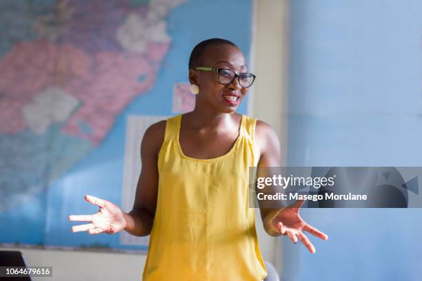 woman giving a presentation - showus africa stock pictures, royalty-free photos & images