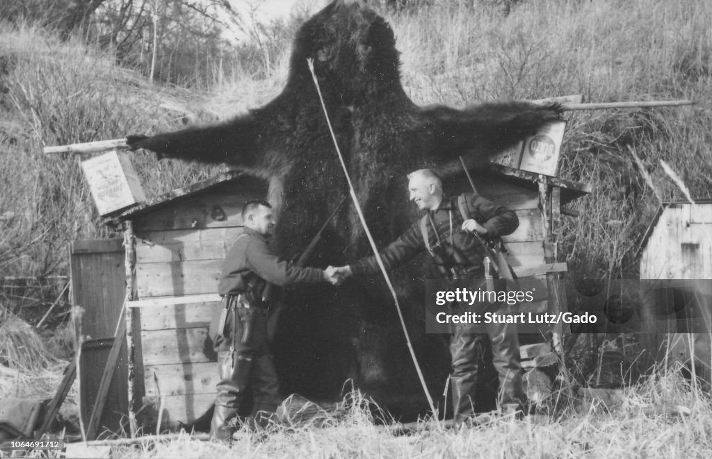 Hunters Shaking Over Bearskin