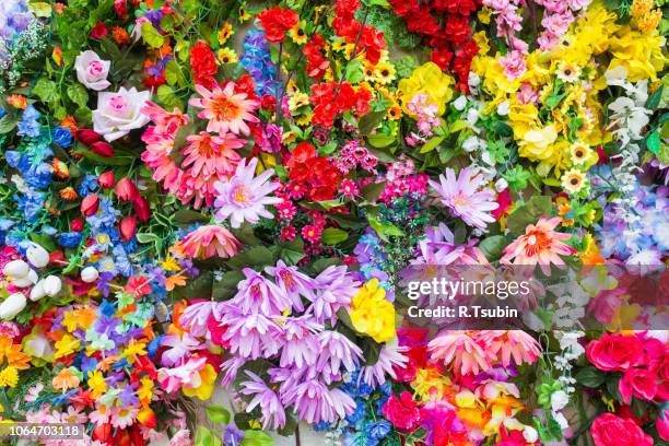 various color flower background wall - flower wall stock pictures, royalty-free photos & images