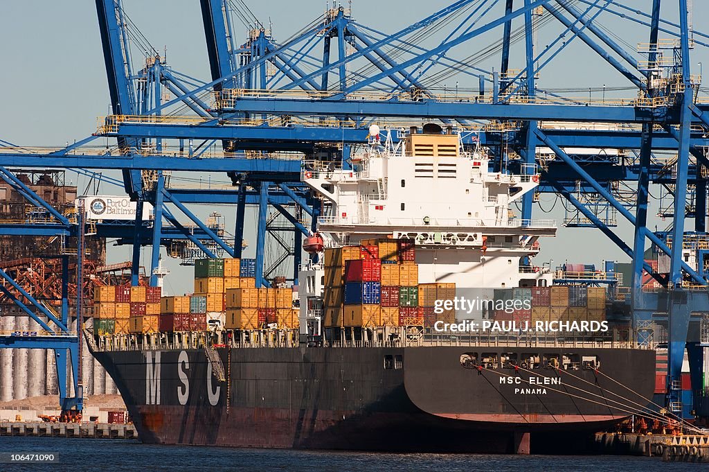 A cargo ship loads up as US Trade Repres