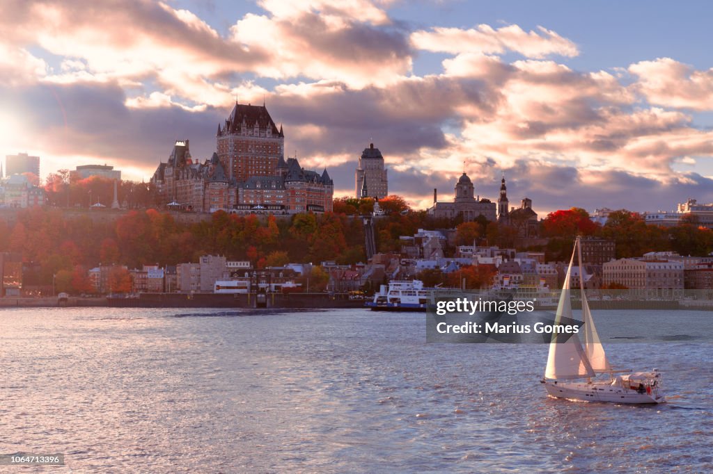 Old Quebec City at Sunset with sailboat in foreground