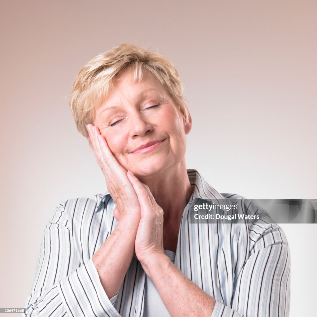 Resting Head Portrait Of Woman Resting Head On Hands High-Res Stock Photo - Getty Images