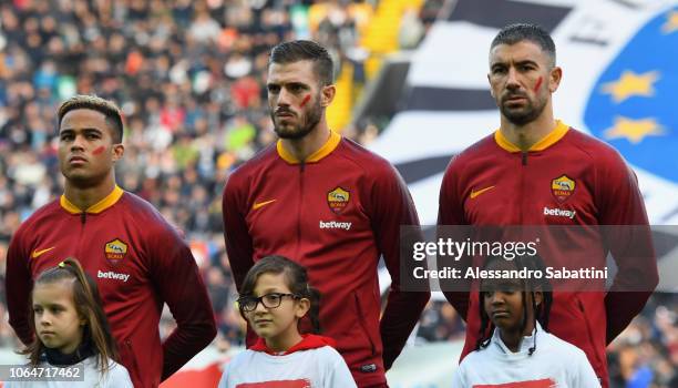 Justin Kluivert of AS Roma, Davide Santon of AS Roma and Aleksander Kolarov of AS Roma wear a red streak on their cheeks as part of a social media...