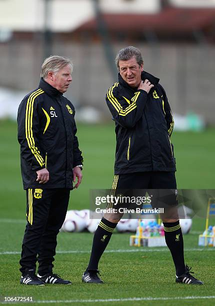 Liverpool manager Roy Hodgson chats to his assistant manager Sammy Lee during a training session ahead of their UEFA Europa League match against SSC...