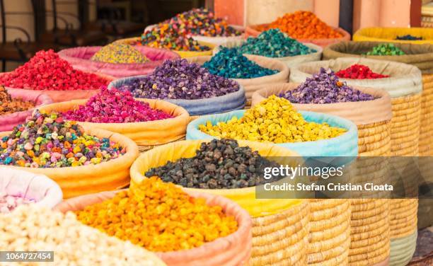 colorful souks on marrakesh, morocco - souq photos et images de collection