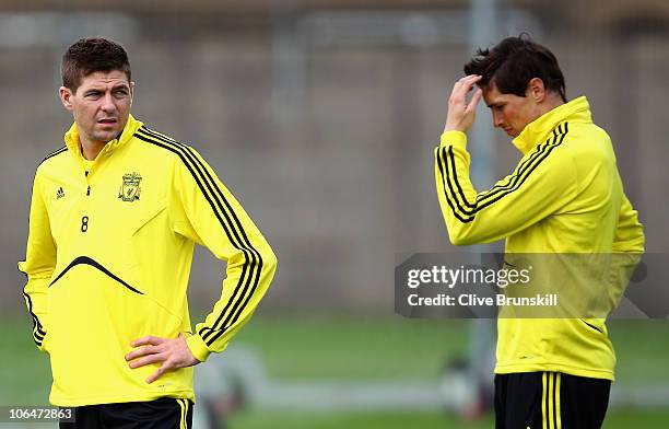 Steven Gerrard of Liverpool with team mate Fernando Torres during a training session ahead of their UEFA Europa League match against SSC Napoli at...