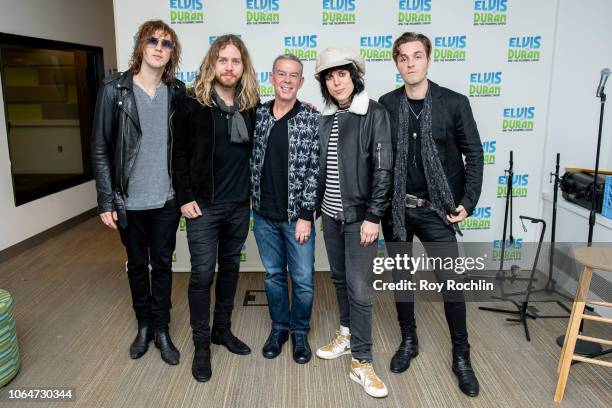 Gethin Davies, Luke Spiller, Adam Slack and Jed Elliott of The Struts with host Elvis Duran as they visit the Elvis Duran show at Z100 Studio on...