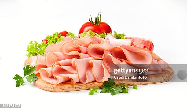 prosciutto a fette sottili - immagine on white board foto e immagini stock