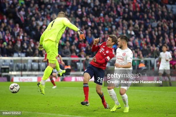 Thomas Mueller of Bayern Munich scores his team's second goal during the Bundesliga match between FC Bayern Muenchen and Fortuna Duesseldorf at...