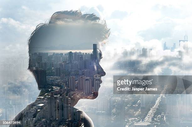 looking over city into clouds - fantasy portrait stock-fotos und bilder