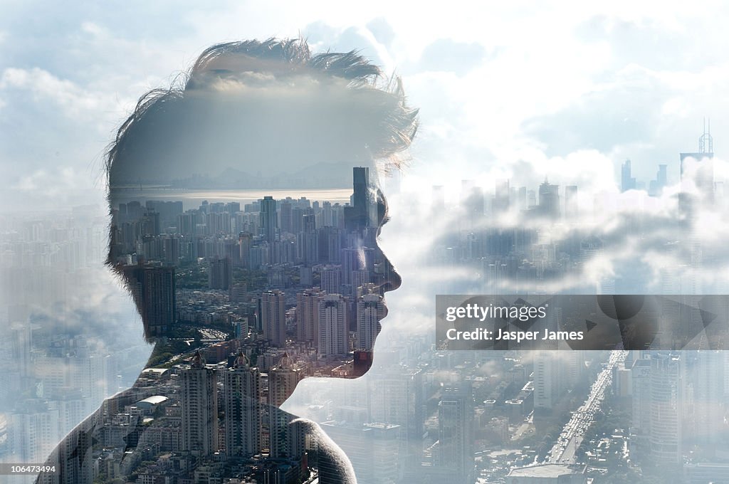 Looking over city into clouds