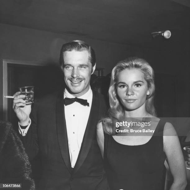 American actors George Peppard and Tuesday Weld attend the premiere after-party for the film 'Breakfast at Tiffany's' in Hollywood, Los Angeles, 17th...