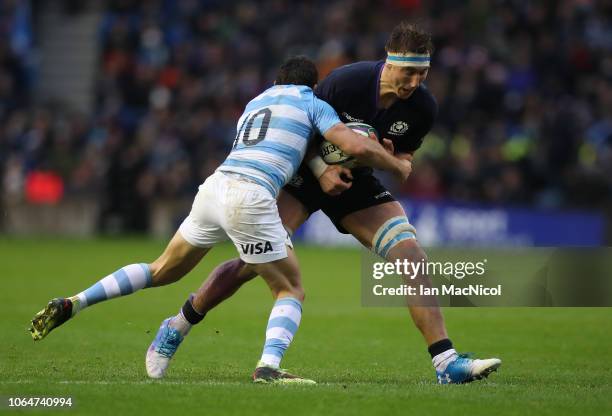 Jamie Ritchie of Scotland is tackles by Nicolas Sanchez of Argentina during the International Friendly match between Scotland and Argentina at...