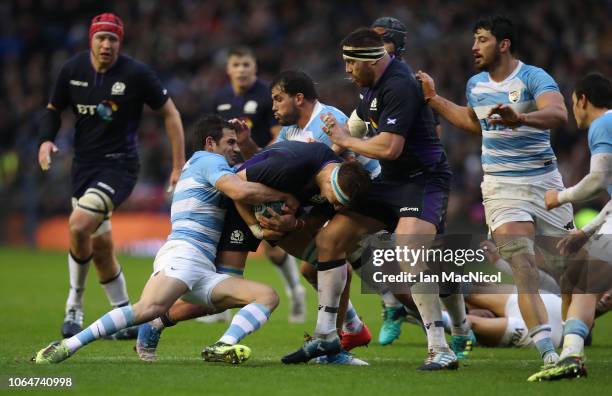 Jamie Ritchie of Scotland is tackles by Nicolas Sanchez of Argentina during the International Friendly match between Scotland and Argentina at...