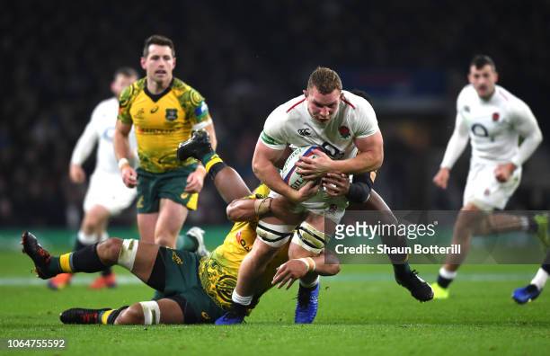 Sam Underhill of England is tackled by the Australian defence during the Quilter International match between England and Australia at Twickenham...