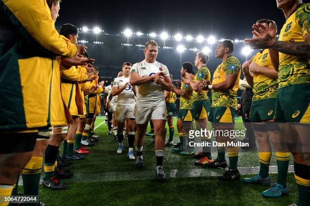 Dylan Hartley of England leads the England players off the pitch while acknowledged by the Australian players after the Quilter International match...