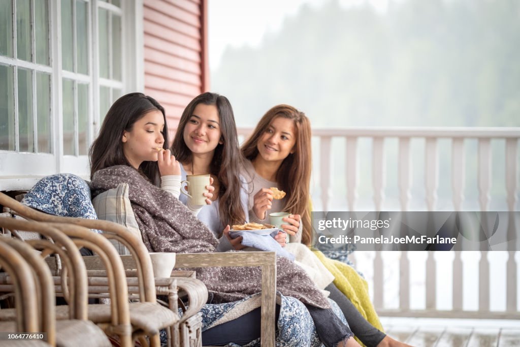 Sisters Outside, Wrapped in Blankets, Chatting, Drinking Coffee, Eating Cookies