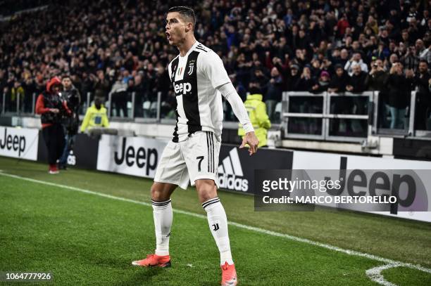 Juventus' Portuguese forward Cristiano Ronaldo celebrates after opening the scoring during the Italian Serie A football match Juventus vs Spal 2013...